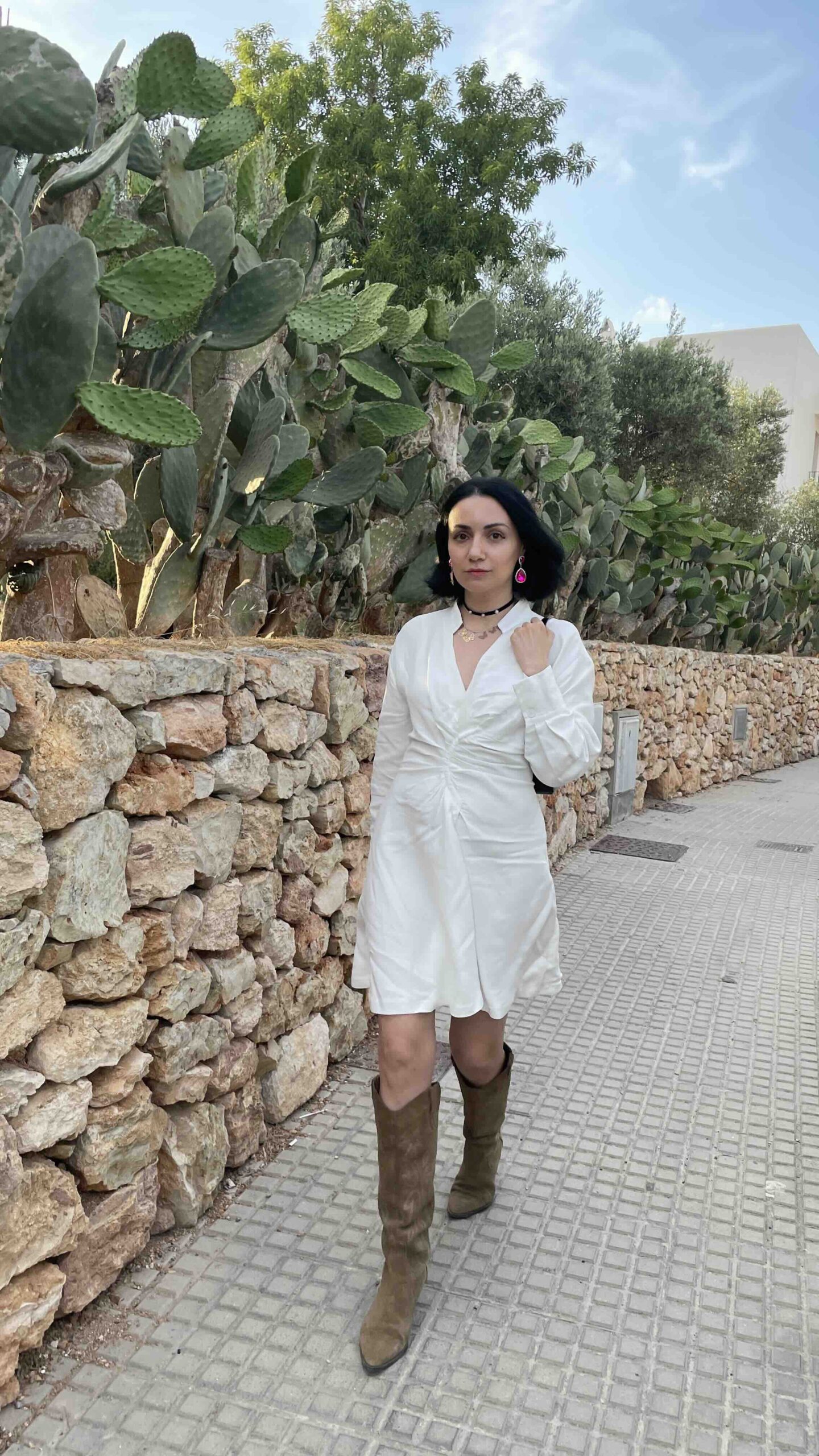 How to Wear Cowboy Boots with a Mini Dress
